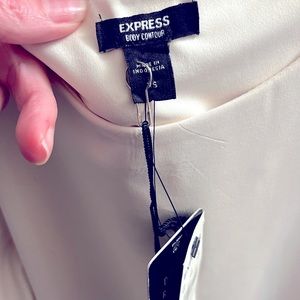 Express, x-small, body contour body suit. New with tags. Ivory.